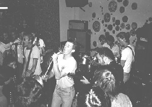 Image of The Neurotics, Billy Bragg, Wiggy and Attila playing a gig in an East Berlin disco